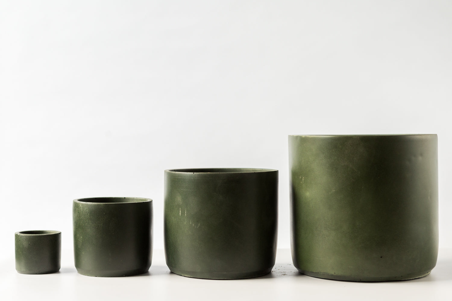 Dark Olive Green Plant Pot hand-made by Concrete Jungle in sizes small through to extra large
