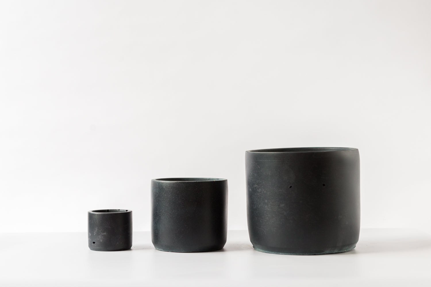Midnight blue plant pots in small medium and large by Concrete Jungle