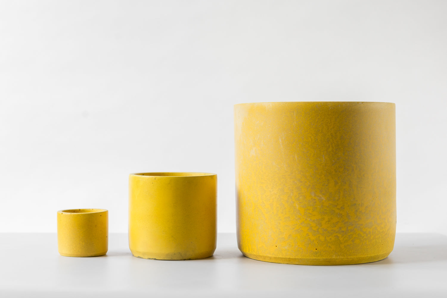 Hand-cast Bold Yellow Pot by Concrete Jungle available in various sizes